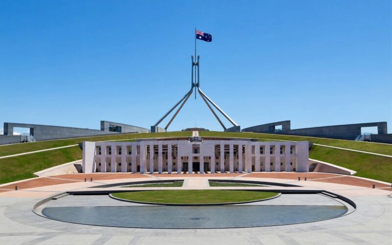 Australia's Parliament House in Canberra with a clear blue sky