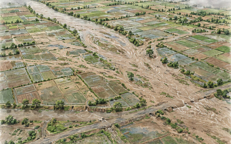 An illustration of a swollen river flooding farmland and a submerged rural road under a monsoon sky.