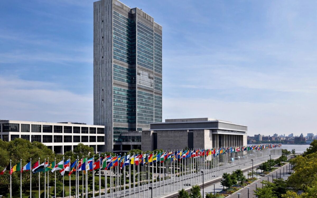 Flags of many nations flying outside the United Nations headquarters during the General Assembly