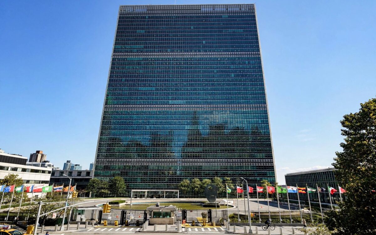 United Nations headquarters with flags in New York